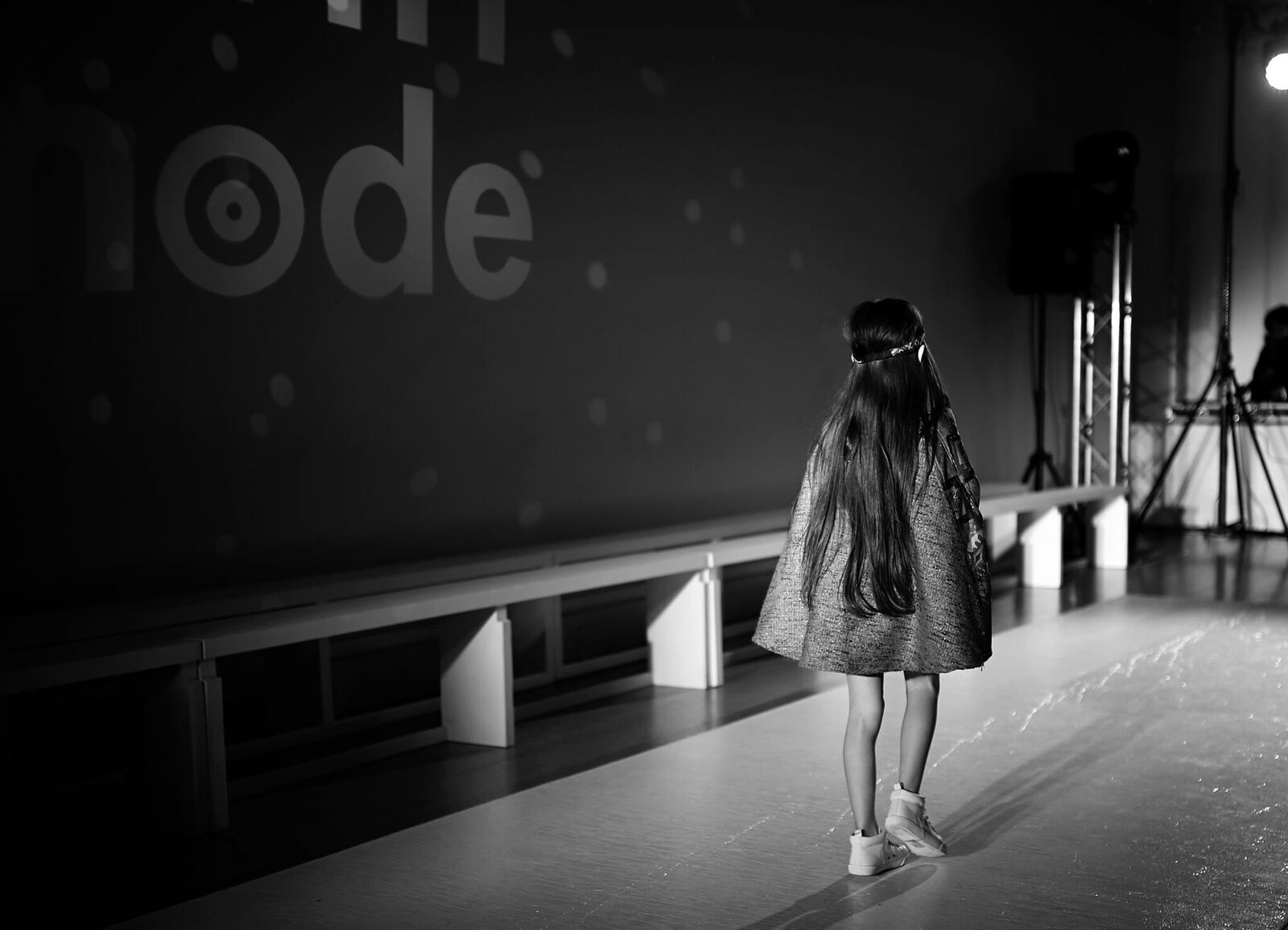 A picture of a child model on the runway for Mini Mode LFW
