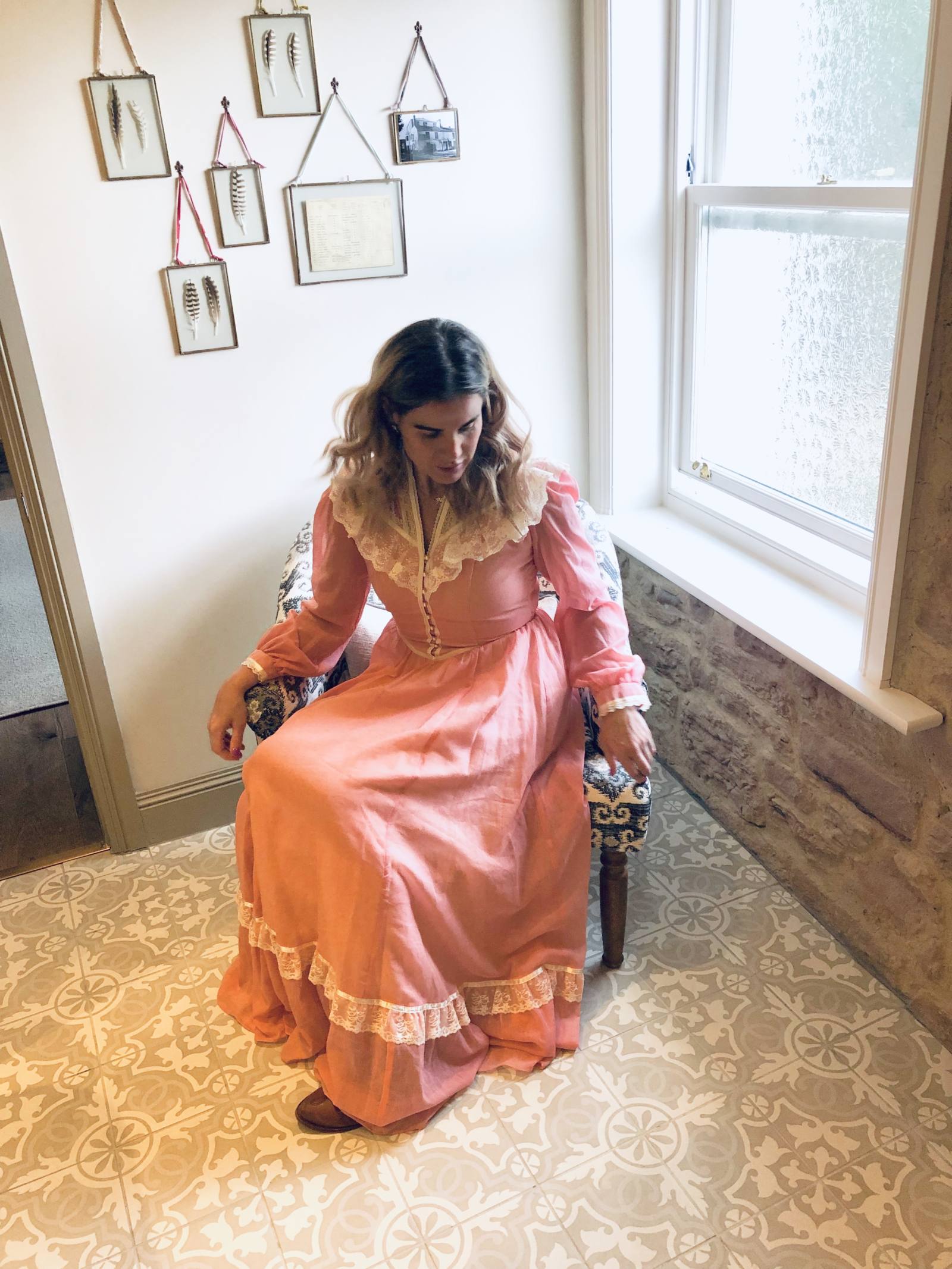 Blogger Pixie Tenenbaum wearing a dusky pink Gunne Sax dress at Beadnell Towers Hotel